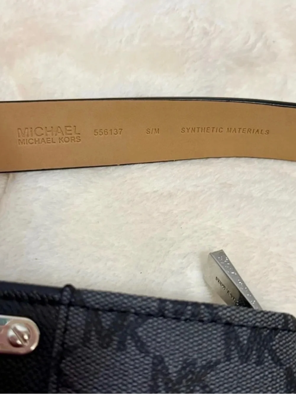 Michael Kors never used